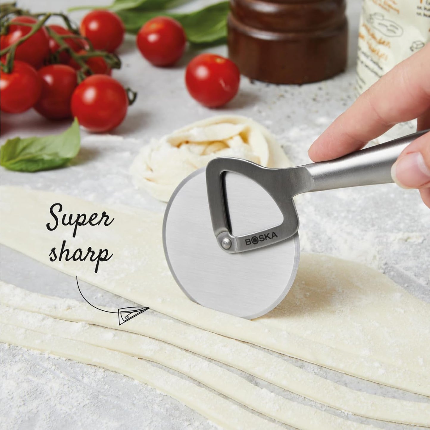 Boska Stainless Steel Pizza Cutter - Copenhagen Multifunctional Pizza Wheel Cutter - Handheld Food Slicer - Silver Non-Stick Adjustable Roller - Dishwasher Safe - For Kitchen Cooking